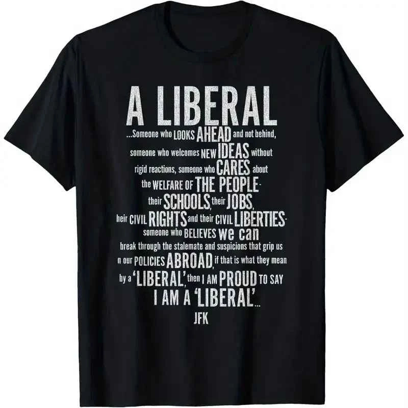 "A Liberal" On this black 100% Cotton T-Shirt, JFK describes the compassion and care that Liberals act with.