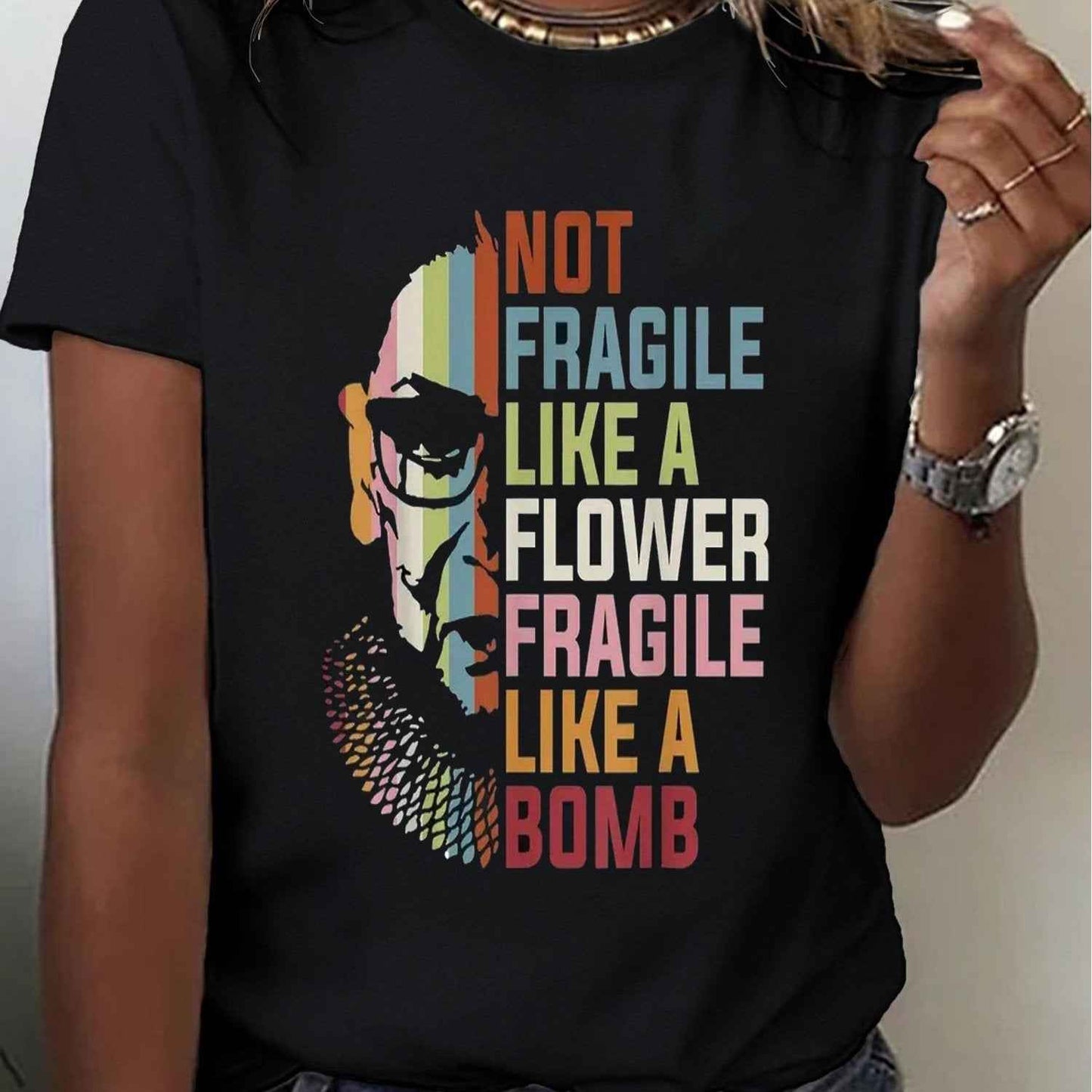 One Of My Faves! Women's Black T-Shirt With A Split picture of The Notorious RBG & "Not Fragile Like A Flower..."